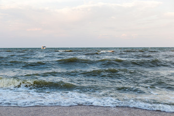Sea landscape with waves on the water in pastel colors