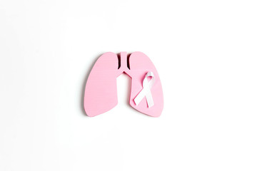 White lung cancer awareness ribbon and lung symbol on white background.