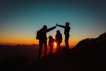 family with kids travel in sunset mountains, parenting concept - 296504299