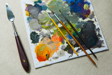 Colored Palette and oil Paint Brushes