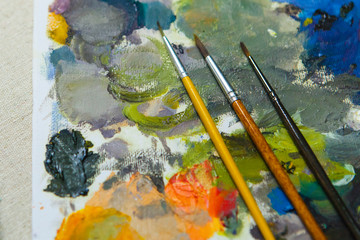 Colored Palette and oil Paint Brushes