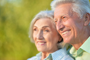 portrait of beautiful senior couple in the park