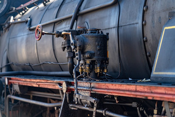 Old steam engine in railway locomotive