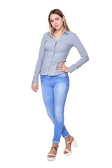 beautiful woman in jeans posing on white