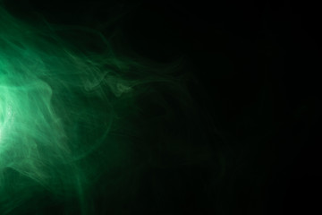 Green smoke - on a black isolated background