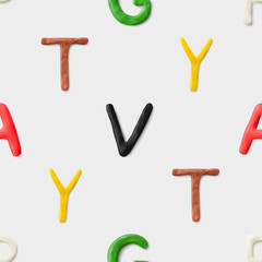 Seamless pattern with alphabet. Handmade modeling clay letters. Realistic 3d vector lettering background.