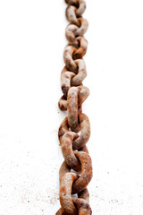 Obraz premium Large old rusty chain on white background