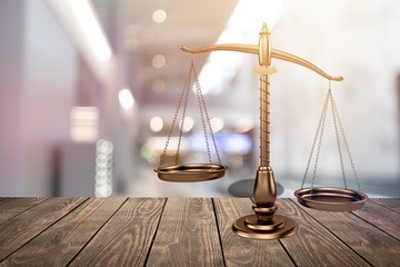 Law scales on table background. Symbol of justice