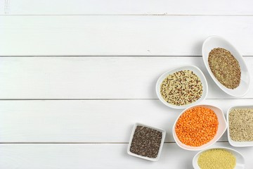 super food in bowls on white ground