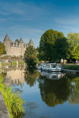 the Oust River canal and houseboats and Chateau Josselin castle