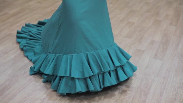 the girl dances flamenco, bata