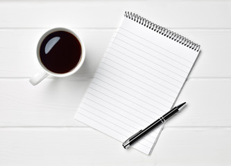 coffee cup note book table paper