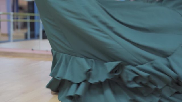 the girl dances flamenco, bata