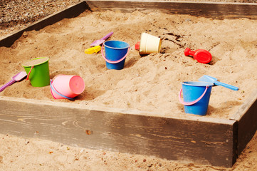 Sandbox with toys