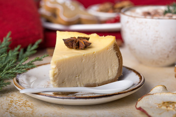 Slice of sweet cheesecake for Christmas Eve. Breakfast concept. Coffee time. Still life of food.