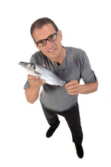 man with sea bass on white background
