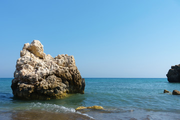 stones stick out of sea water