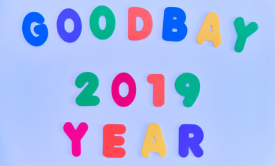 Text, goodbye 2019, in multicolored letters on a blue background