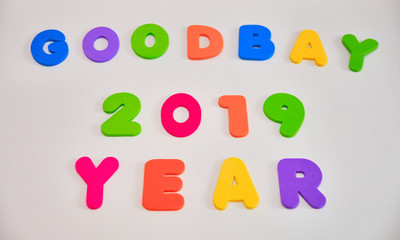 Text, goodbye 2019, in multicolored letters on a blue background