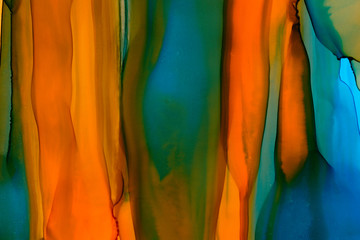 Mixed colors watercolor texture background. Hand drawn orange and navy smears, splashes abstract backdrop, alcohol ink.