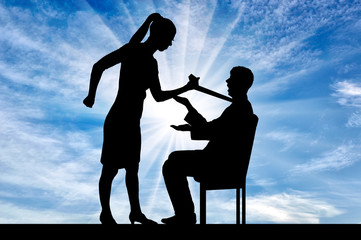 Silhouette of a standing woman holding a tie for a man who is sitting on a chair