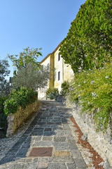 Province of Salerno, Italy, 10/13/2018. A road among the old houses of a mountain village.