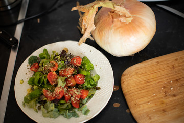 fresh cooking a salad and vegetables