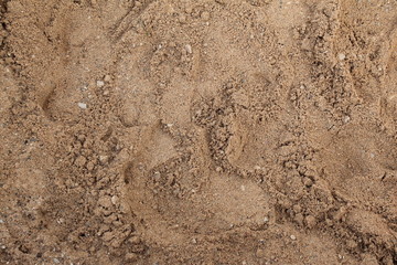 dark sand on the ground for background on site or design