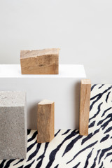 concrete blocks, raw wood and zebra carpet.