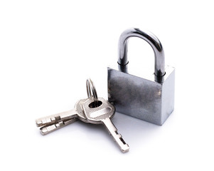 Metal padlock with keys on a ring isolated on white background