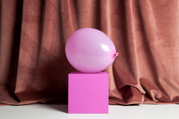 colourful velvet pink balloon cube podium