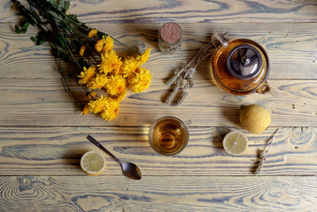 Useful herbal tea with a plant (Sideritis scardica) and lemons close-up