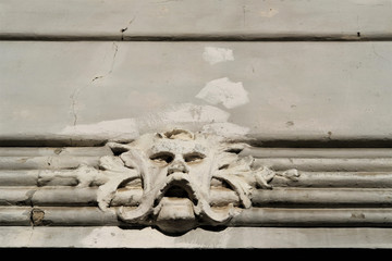architectural detail - men's face with a moustache