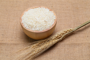 rice in bowl  on sack background