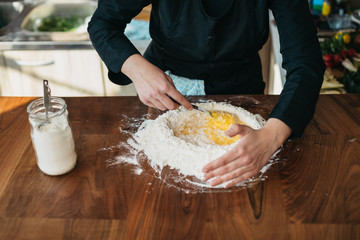 Chef making fresh pasta in the kitchen