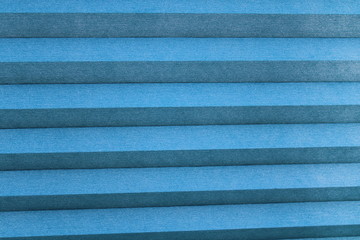 blue plastic background with stripes blinds