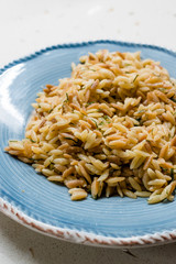 Turkish Cooked Orzo Pasta in Plate / Pilav or Pilaf. Organic Food.