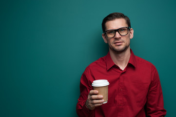 Portrait of smiling handsome young man in glasses