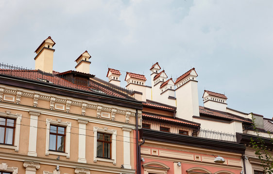 Roofs of houses with chimneys