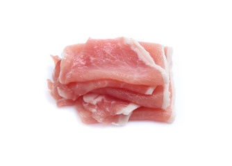 Raw pork meat with parsley herb leaves isolated on white background