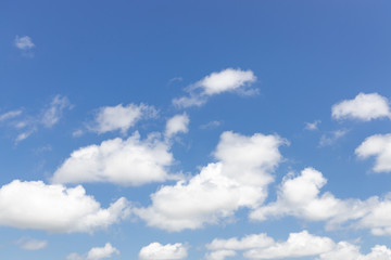 Naklejka na ściany i meble Clear blue sky with clouds.