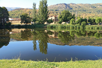Natural landscape, river and reflections