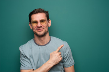 Portrait of a handsome young man with a blue shirt