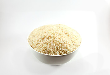 Jasmine rice cultivated in Thailand is in a white cup,isolated white background