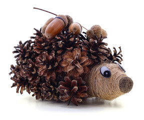 Hedgehog with cones and acorns. © voren1