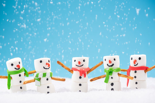 Happy Marshmallow Family Play in Snow. Funny Festive Christmas Card