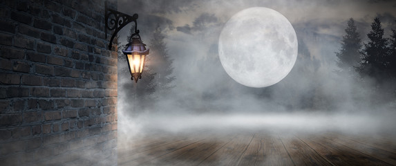 Fototapeta na wymiar Dark street, a lantern on an old brick wall, a large moon, smoke, smog. Night scene of the old city, dark forest.