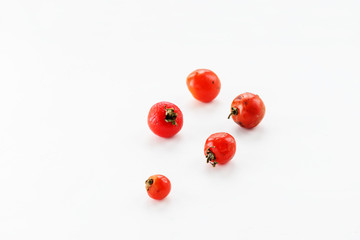 Ugly rotten tomatoes on a light background.