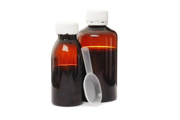 two Amber glass bottle of Brown mixture for relieves cough, text on white cap means This way to break seal and to open, isolated on white background, Clipping path.