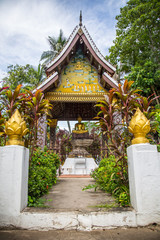 Fototapeta na wymiar Lovely entrance in a Luang Prabang temple. Laos